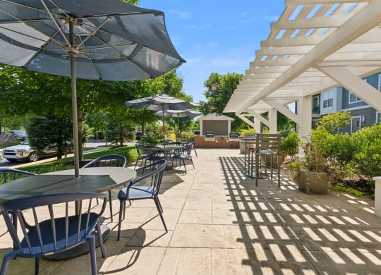 Outdoor courtyard with grills and seating