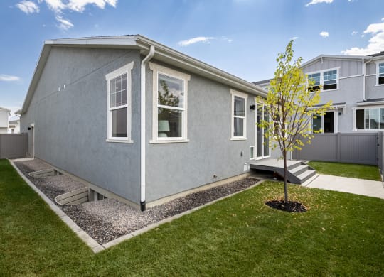 Back yard with patio and landscaped yard
