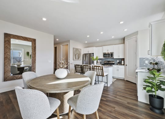 Dining room and kitchen area furnished