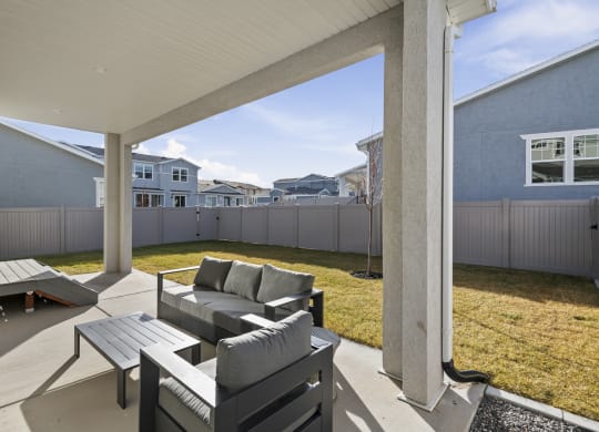 Covered patio and fenced in yarf