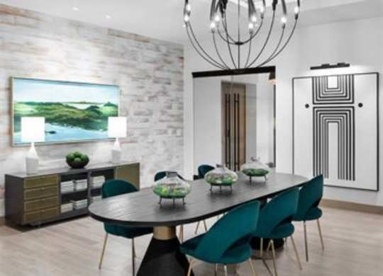 A modern dining room with a large table and chairs.at 198 Milltown Apartments, Burlington, NC  