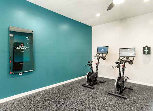 two exercise bikes at WildForest Apartments, Birmingham, AL