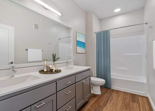 modern bathroom with soaking tub at The Hallon Apartments, Hopkins MN, 55343
