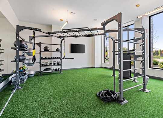 Fitness Center with Free Weights at The Hallon Apartments,  Hopkins