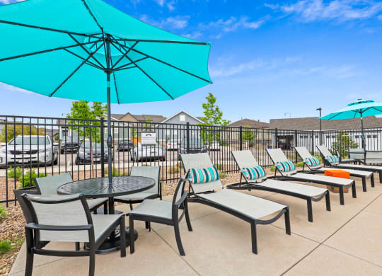 the reserve at bucklin hill patio with umbrellas and chairs