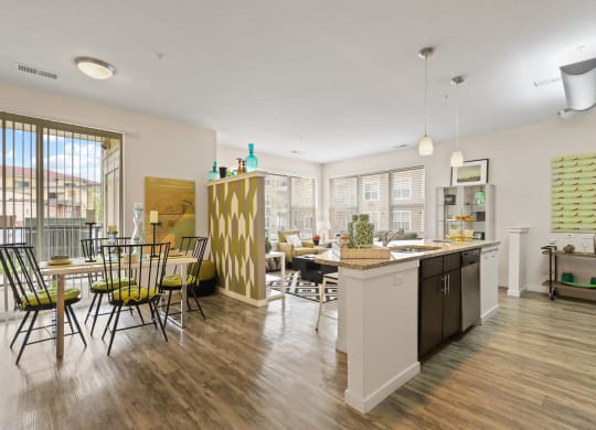 an open floor plan with a kitchen and dining area