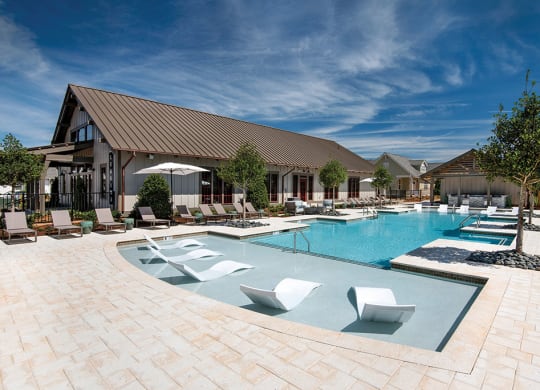 side view of the pool with seating at the cottages