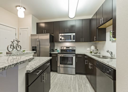 Gourmet Kitchen at Westlink at Oak Station Apartments in Lakewood, CO