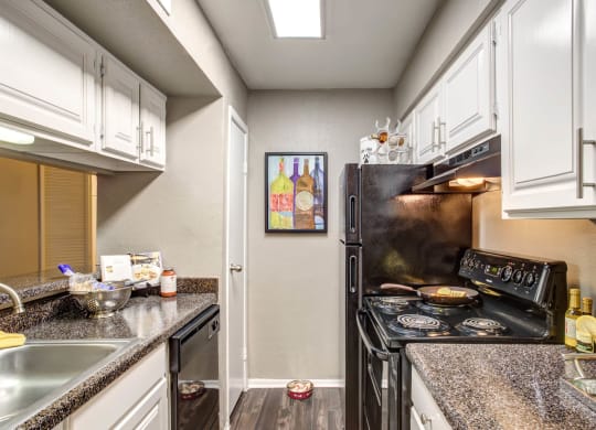Fully Equipped Kitchen With Modern Appliances at 2400 Briarwest Apartments, Houston, TX, 77077