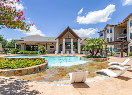 Swimming Pool With Relaxing Sundecks at Park Hudson Place Apartments, Bryan, Texas