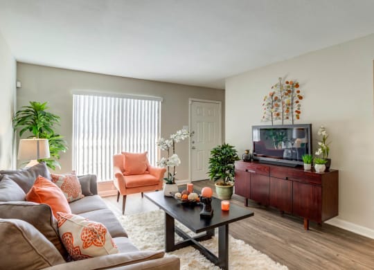 Living Room With TV at The Reserve at City Center North, Houston, TX
