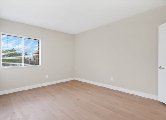 Bedroom with Carpet and Windows at Verde Apartments, Tucson, AZ