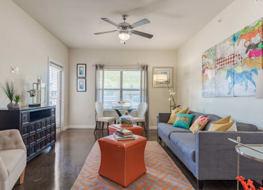 living room with furniture and a ceiling fan  at Legacy Brooks, San Antonio, 78223