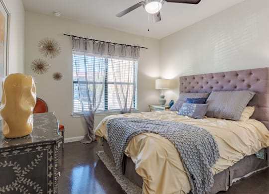 Bedrooms with Ceiling Fan, Large Window and Dresser  at Legacy Brooks, San Antonio, 78223