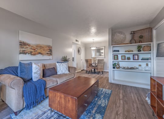 Living room with a couch and a coffee table  at Riverstone, Texas, 77802
