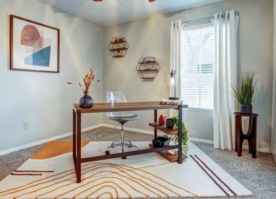 Home office with a ceiling fan and a window  at The Wick, College Station, Texas