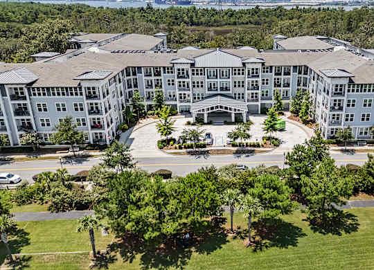 A large, multi-story building with a courtyard in the center.