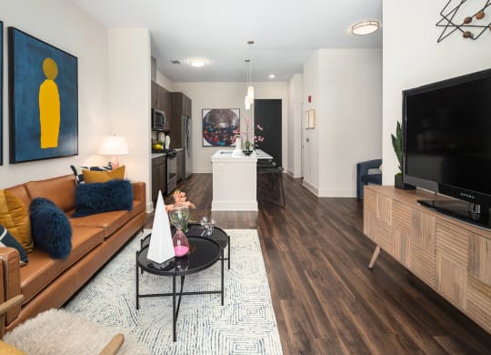 a living room with a couch and a table