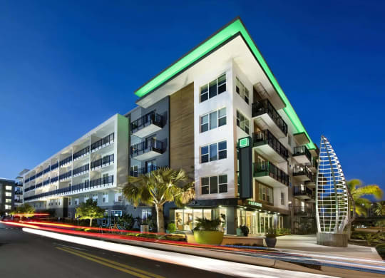 Anchor Riverwalk Entrance Featuring Illuminated Sculpture and Modern Leasing Center