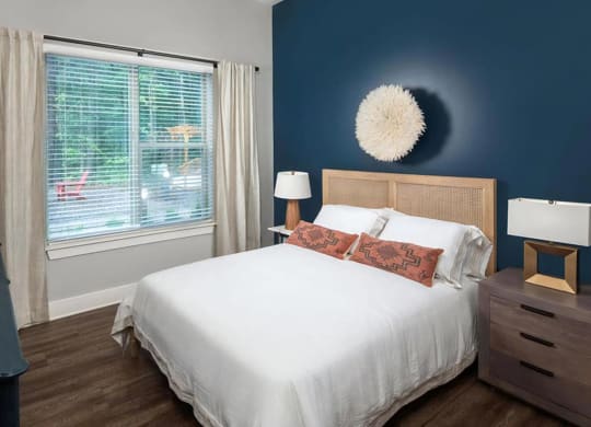 Large Windows Allow In Plentiful Natural Light Featuring Blinds