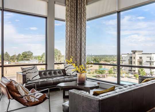 Gateway Arvada Ridge Lounge Area with Panoramic Windows and Modern Seating