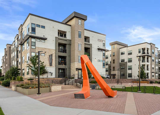 Gateway Arvada Ridge Contemporary Apartment Exterior with Outdoor Sculpture