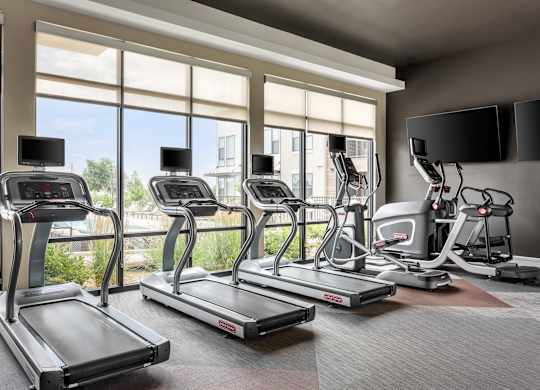 Gateway Arvada Ridge Fitness Studio with Cardio Machines and Expansive Windows