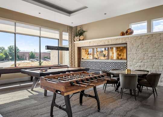 Gateway Arvada Ridge Game Room with Foosball Table and Multiple Seating Areas