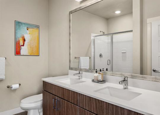 Gateway Arvada Ridge Bathroom with Dual Sink Vanity and Walk-In Shower