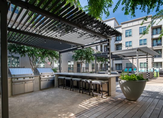 Outdoor Kitchen with Covered Grilling Stations