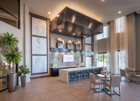 Lobby with Coffee Station, Pendant Lights, and Lounge Tables