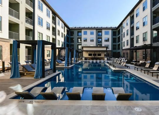 The Elm at River Park Pool with Shaded Cabanas and Lounge Deck