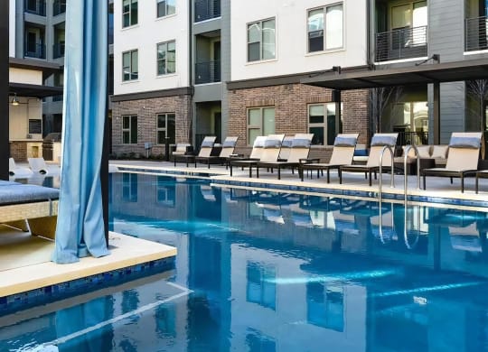 Private Poolside Retreat with Cabanas and Chaise Loungers