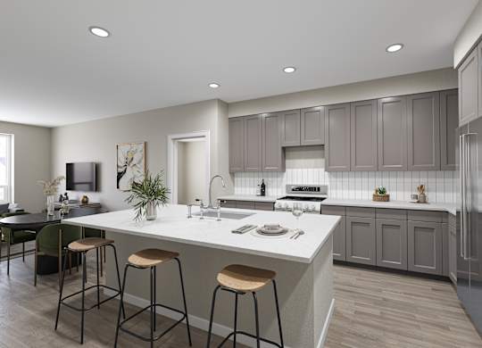 a kitchen with a large island with three stools