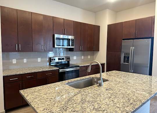 Large Kitchen with Stainless Steel Appliances