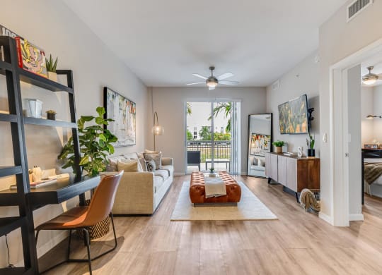 Open Layout with Living Room, Sliding Glass Door, and Work Desk