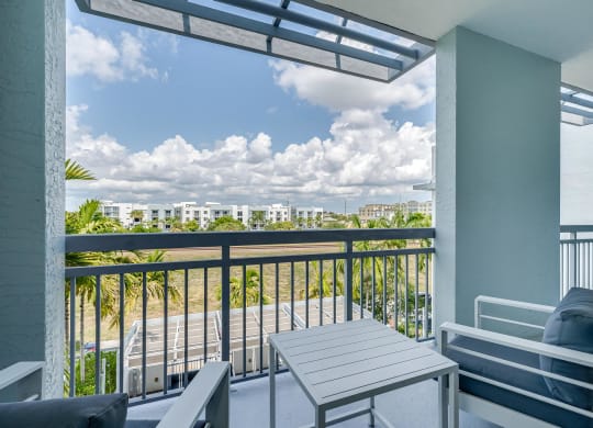 Private Balcony with Seating and Open Sky Views