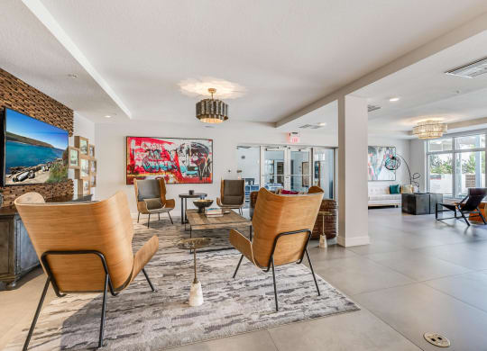 Resident Gathering Lounge with Lounge Chairs and Clubroom Access