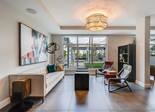 Lounge Seating with Sofa, Accent Chairs, and Large Windows