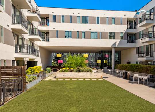 A modern building with a courtyard in the middle.