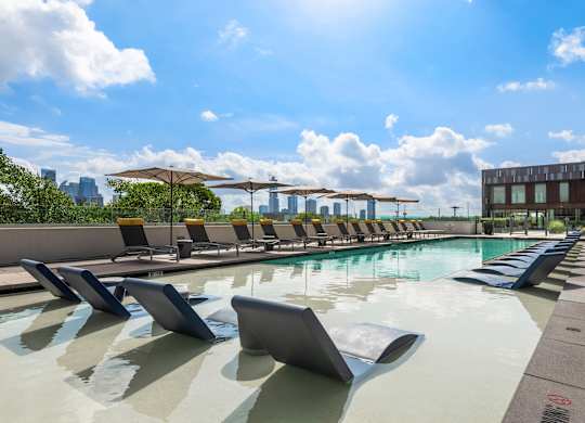 Relaxing Pool Area with Stunning City Views