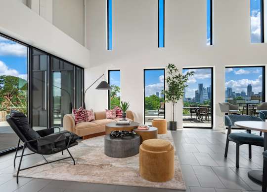 Resident Clubhouse with Downtown Views, Lounge Areas, and Entertainment Kitchen