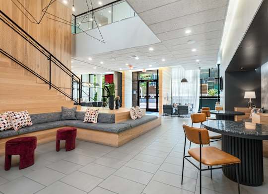 Resident Lounge Featuring Plush Benches and Bold FinResident Lounge Featuring Plush Benches and Bold Finishes