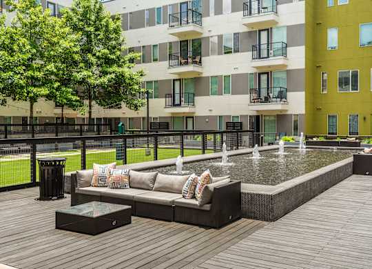 Serene Outdoor Seating with Peaceful Fountain