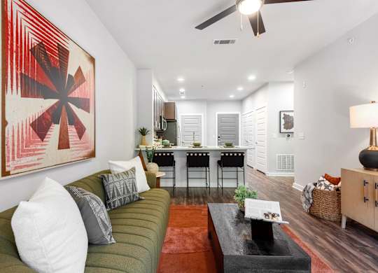 Modern Living Area with Colorful Touches and Seamless Kitchen Access