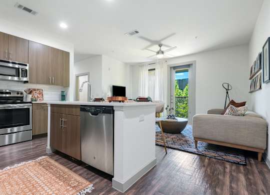 Open-Concept Layout with Kitchen Island and Cozy Living Area