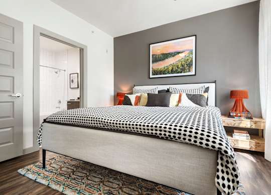 Spacious Second Bedroom with Wood Floors and Ensuite Bath