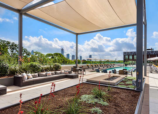 Outdoor Lounge Featuring Fire Pit and Comfortable Modular Sofas