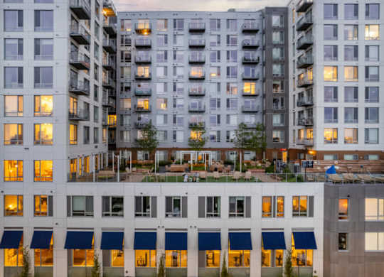 A large building with a lot of windows and balconies.