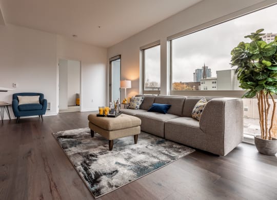 a living room with a couch and a chair